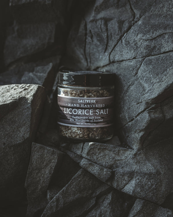 Jar of Saltwerk Licorice Salt on a textured dark surface
