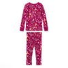 Child wearing Woodland Dreams two-piece bamboo blend pajama set with long-sleeve top and matching pants featuring horses, owls, and stars print