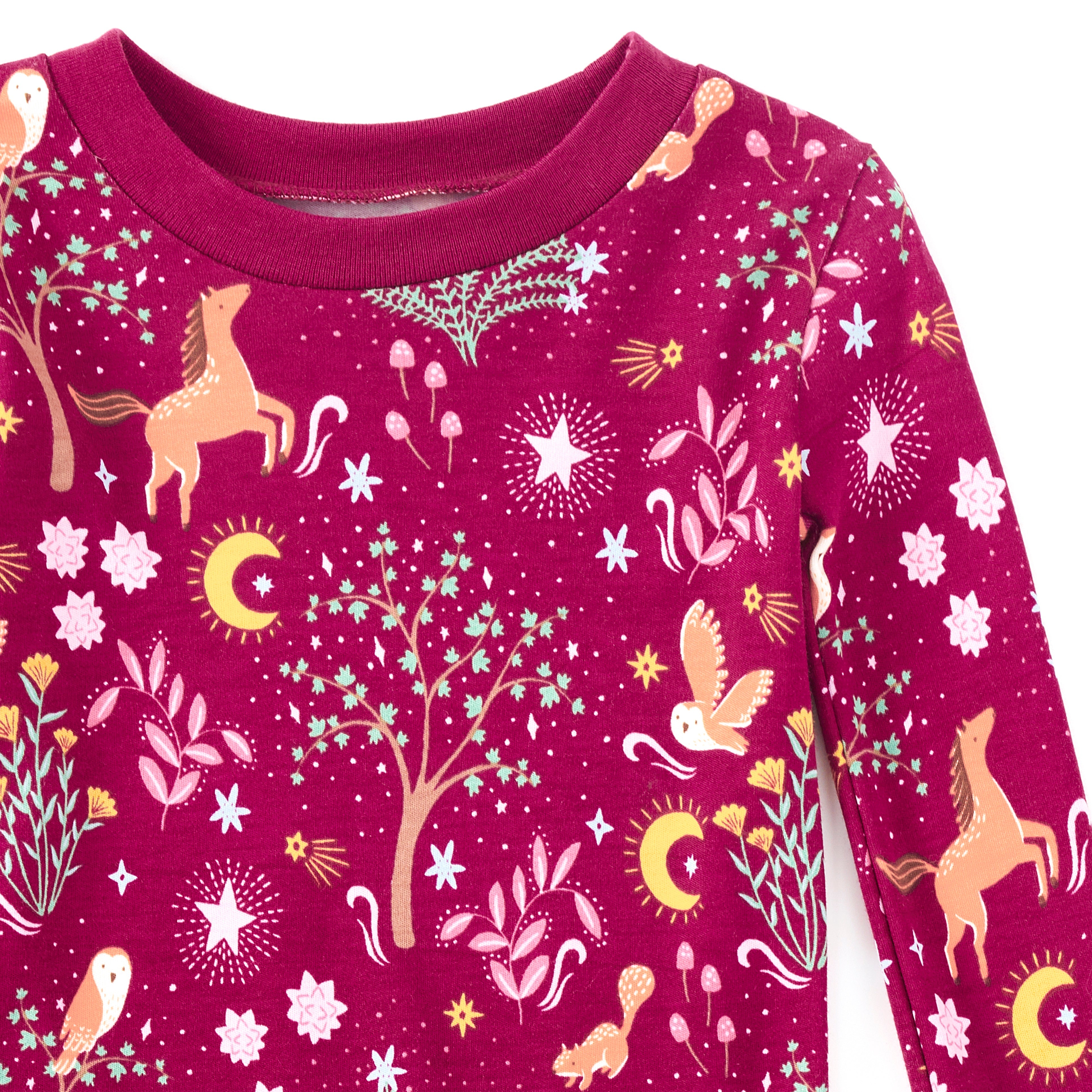 Close-up of Woodland Dreams kids pajama set showing ribbed cuffs and all-over enchanted woodland print on bamboo organic cotton fabric