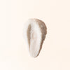 Beige makeup swatch on a light beige background