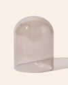 Set of translucent dove candle cloches displayed with candle vessel accessories