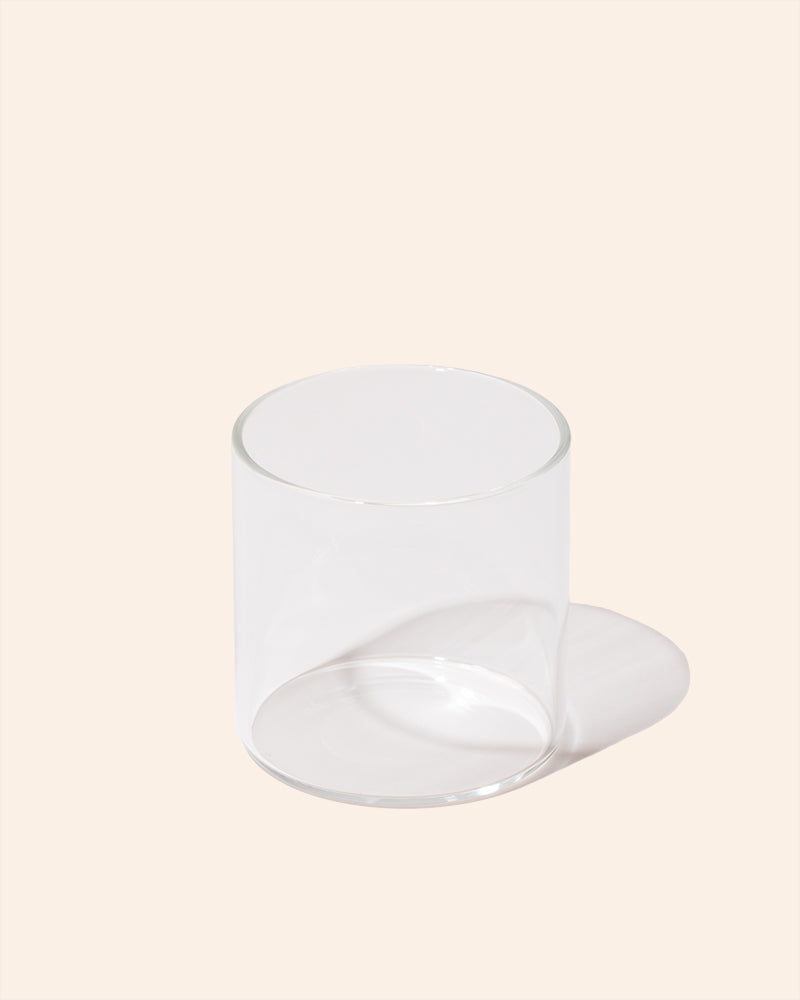 Translucent candle refill insert glass jar shown with other vessel accessories