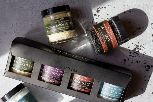 Collection of Saltervek salt products on a gray surface