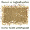 Rectangular cardboard product with straw-like material on a white background, text about drying and fragrance.