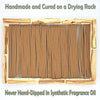Wooden rack with incense sticks and text about natural incense making process.