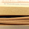 Close-up of brown incense sticks with a blurred background