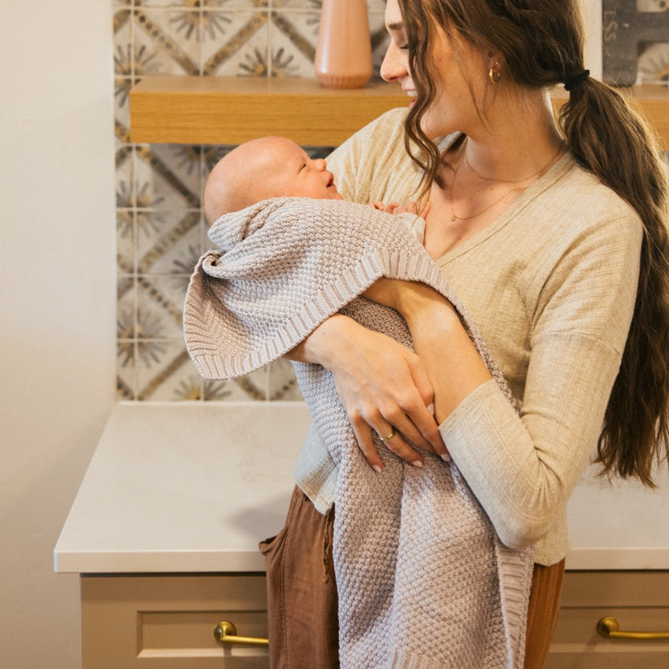 Plum+Sparrow knitted baby blanket in Thistle colour, 100% cotton with textured rib and garter stitch