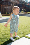 Close-up of Blooming Saguaro bamboo blend baby romper showing cactus illustration print detail