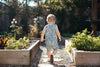 Baby modelling the Apple Park Blooming Saguaro organic cotton bamboo sleeveless romper