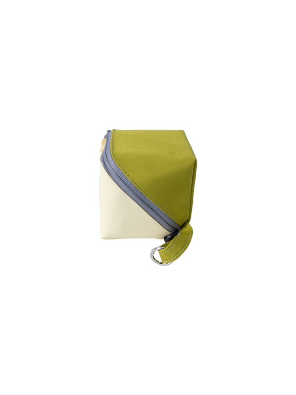 Green and beige bag with a zipper on a white background. Organize with the "Pistachio" Organizer Bag. Made from 6 recycled plastic bottles, this wide-mouth organizer provides instant visibility for tech cables, makeup, and essentials. The perfect sustainable, high-capacity gift for an organized life.