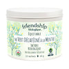 Container of Friendship Biologique green tea with mint flavor on a white background