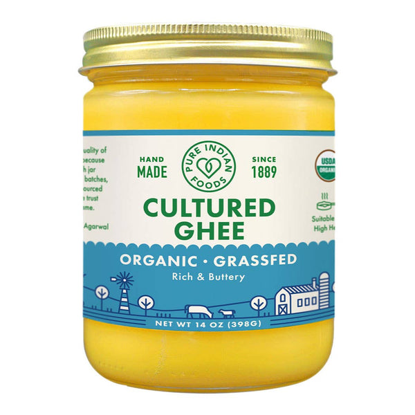 Jar of Ethical Trade Co certified organic grass-fed cultured ghee on a natural background