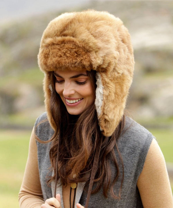 Baby alpaca Chullo fur hat with structured earflaps — side view showing artisan detail