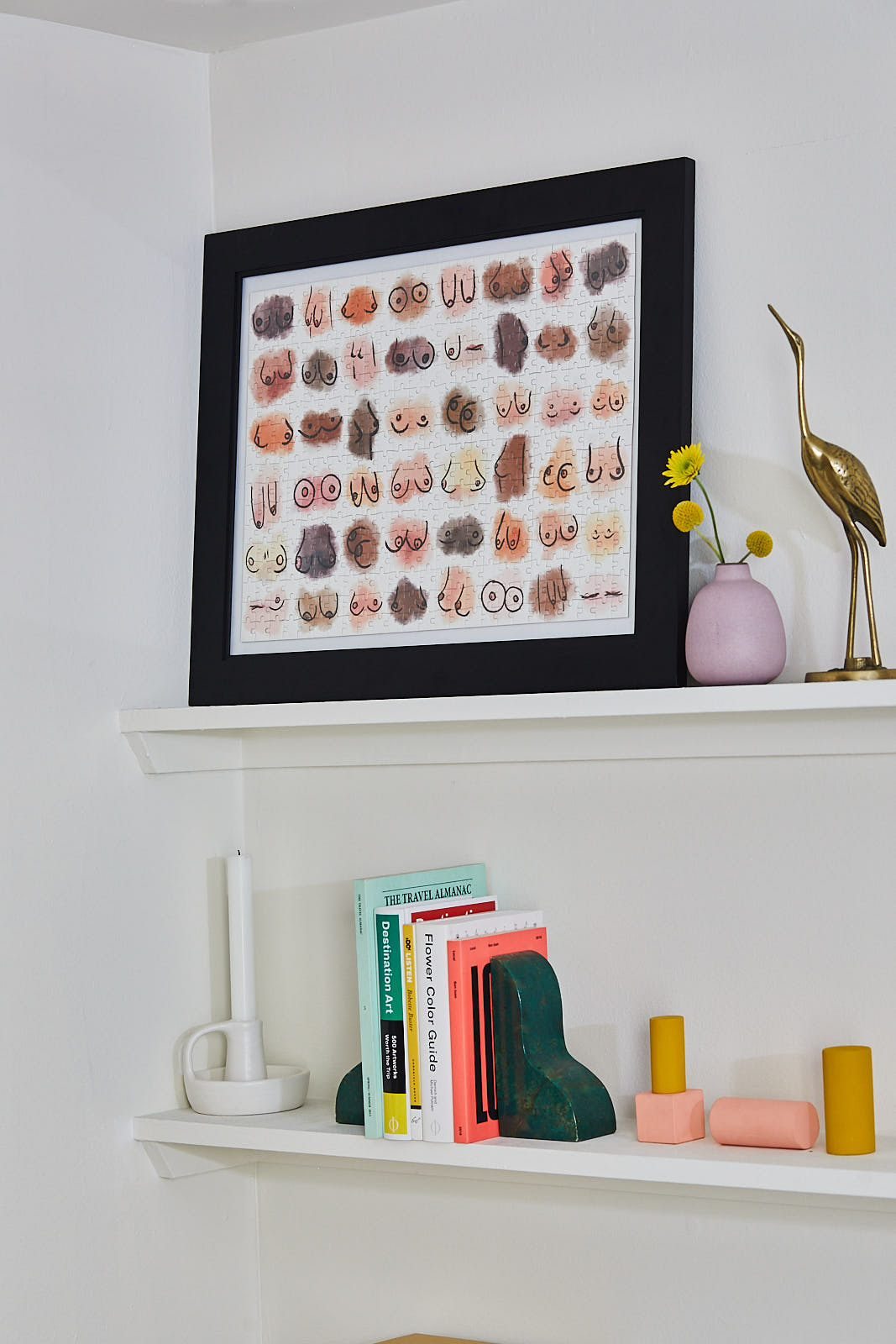 Boobs jigsaw puzzle by Julia Heffernan displayed with included puzzle glue and straight-edge tool