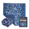 Reusable furoshiki gift wrap by Danni Ha wrapped around a gift, styled as a sustainable zero-waste present