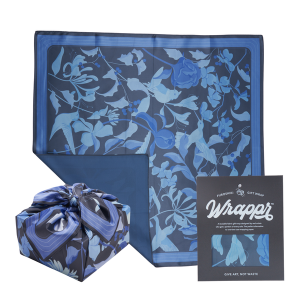 Reusable furoshiki gift wrap by Danni Ha wrapped around a gift, styled as a sustainable zero-waste present