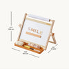 A wooden ABC lettering and drawing board set with a white writing surface, wooden frame, letter tray, drawing tools, and measurement annotations showing dimensions in centimeters and inches.