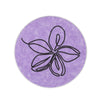 Round purple coaster with a black floral design on a white background