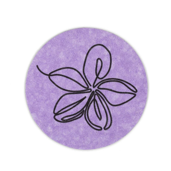 Round purple coaster with a black floral design on a white background
