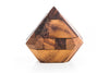 12 non-identical wooden pieces of the Japanese Diamond Puzzle laid out separately