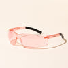 makesy® pink safety glasses with scratch-resistant wrap-around lens and non-slip rubber grips, front view