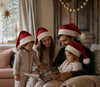 No Plastic Family Santa Hat shown in child and adult sizes side by side