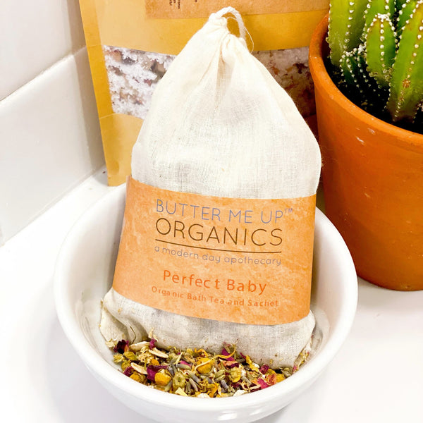 Organic baby bath tea sachet with lavender, chamomile, calendula, rose petals and oats in an unbleached muslin bag