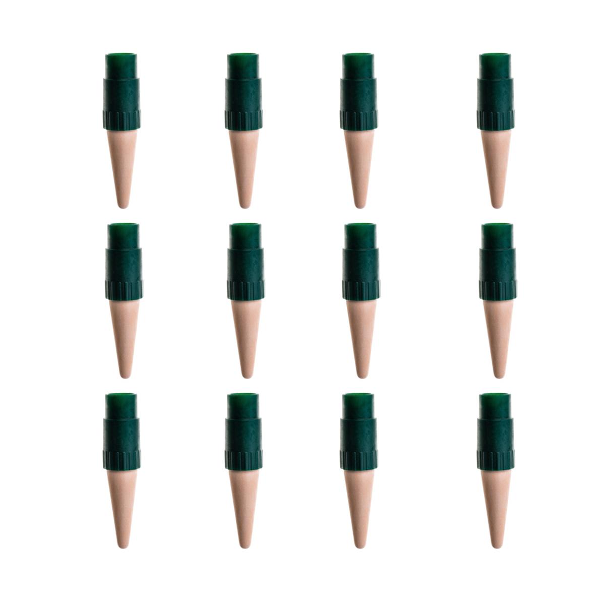 Set of 16 wooden tent stakes with green plastic tips on a white background