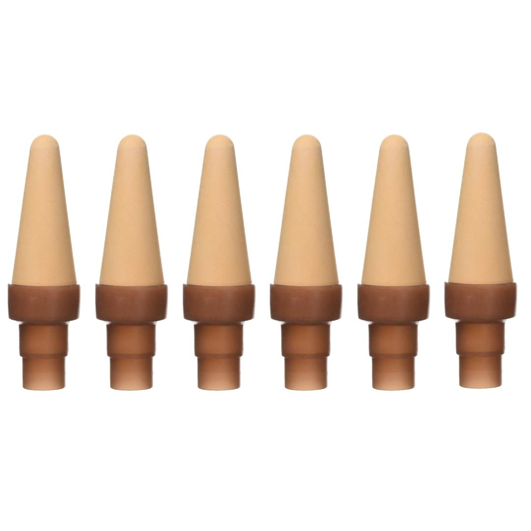 Set of six beige and brown cone-shaped objects on a white background