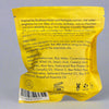 Yellow package with text and a barcode on a gray surface