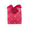EverBow red bow styled on a wrapped gift with EverWrap packaging