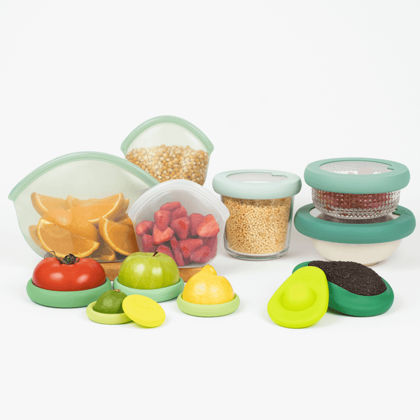 Avocado Huggers and Hugger Bags from the Food Huggers Eco Pro Bundle on a kitchen countertop