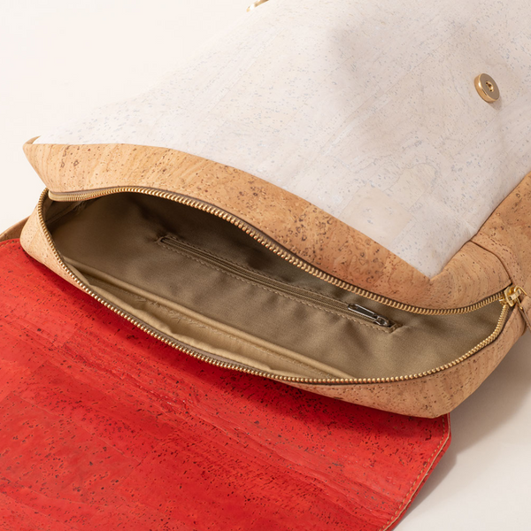 Cork handbag with a gold zipper on a white background