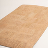 Beige cork mat on a white background
