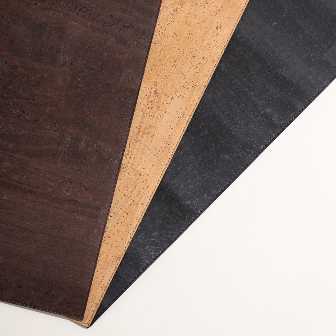 Three different colored leather samples on a white background