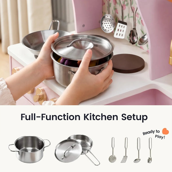 A child's hands are shown holding a stainless steel play kitchen pot and lid over a pink toy kitchen counter. The top half shows the hands-in-use context, while the bottom half has a 'Full-Function Kitchen Setup' banner with additional stainless steel cookware and utensils labeled 'Ready to Play!'.