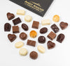 Andy Anand handmade sugar free Belgian chocolate truffles in an open gift box, 25 pieces
