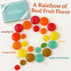 Individually wrapped sugar-free mixed fruit hard candies spread out, made with stevia and no aspartame