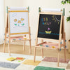 Two children's easels with whiteboard and blackboard surfaces, one with drawings and the other with colorful letters and numbers.