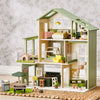 Tiny Land Sweetwood Edge wooden dollhouse in green and pink, front view