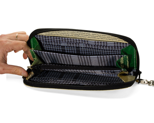 The Network Recycled Wallet is the perfect blend of style and security. Made from recycled materials and featuring a durable triple-zipper design, this wallet is both functional and sustainable. Keep your essentials organized and make a positive impact on the environment. Order yours today!