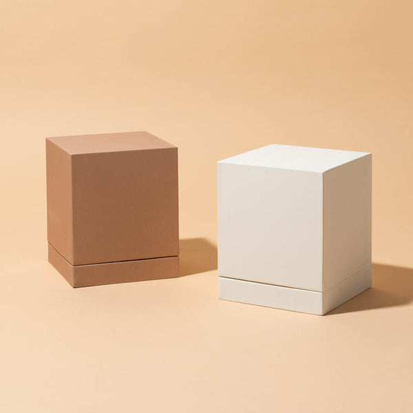 Makesy tan and porcelain rigid candle gift boxes shown in large format side by side