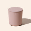 Pink cylindrical container on a light beige background