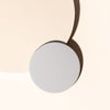 Matte cream thin metal candle lids placed on top of 12 oz candle jars