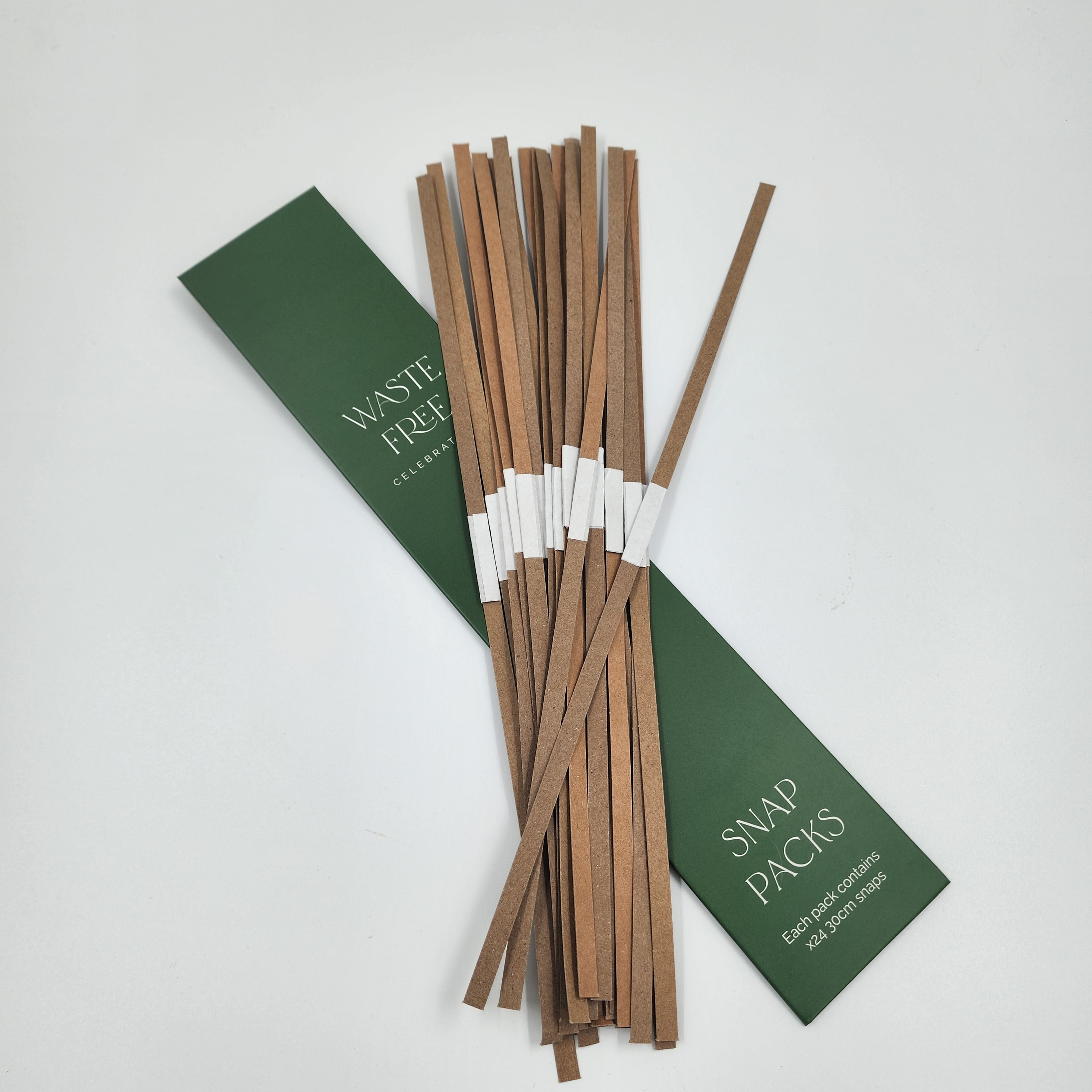 Pack of 24 twelve-inch snaps for reusable Christmas crackers by Waste Free Celebrations