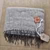 Awana Alpaca Pashmina draped as a shawl, displaying its lightweight natural alpaca and cotton blend fabric