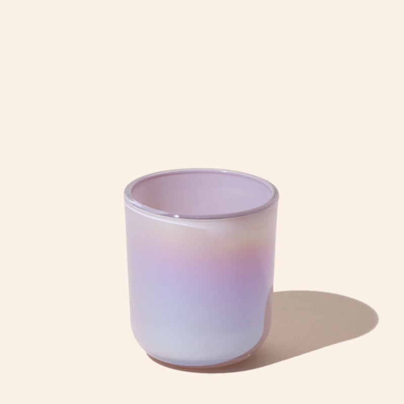 Gradient-colored glass on a light beige background