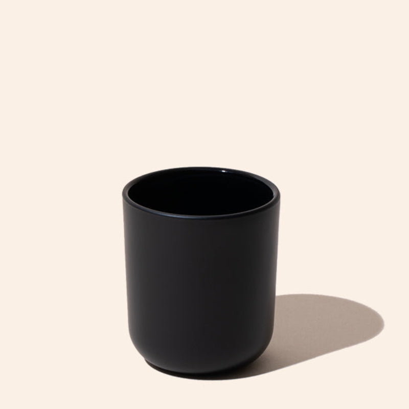2.5oz Aura® candle vessel in matte black finish — minimalist glass candle jar by makesy®