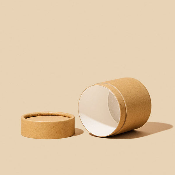 6.7oz kraft jar shown open, revealing biodegradable wax paper lining