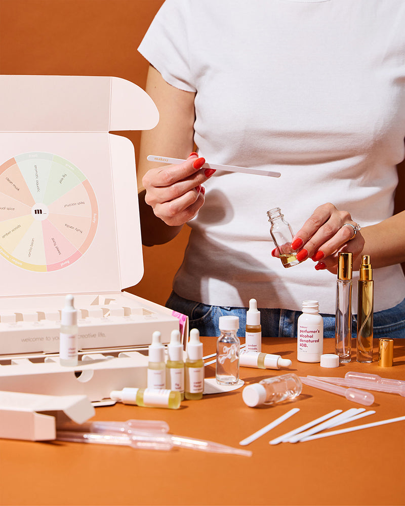 Lifestyle shot of the makesy® Create Your Own Perfume Kit displayed as a thoughtful gift